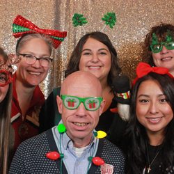 The Columbus Photo Booth Company - Photo in front of the Magic Mirror at a corporate holiday party