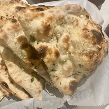 Spice & Tonic - Indian Cuisine - Garlic naan - Indian Near Me - Highland Village, Texas Spice & Tonic - Indian Cuisine - Garlic naan - Indian Near Me - Highland Village, Texas