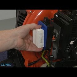 Repair Clinic - A close up of a technician replacing the air filter on an Echo leaf blower, showcasing small engine repair