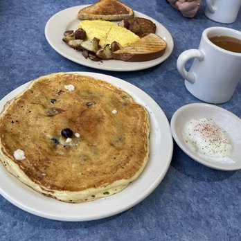 Downtown Diner - Classic breakfast, 2 eggs scrambled with home fries, sausage patty and rye toast. Single blueberry pancake with poached egg on the side. - Diners Near Me - Lake Placid, New York Downtown Diner - Classic breakfast, 2 eggs scrambled with home fries, sausage patty and rye toast. Single blueberry pancake with poached egg on the side. - Diners Near Me - Lake Placid, New York