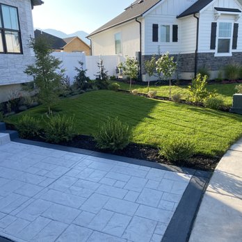 Sprinkler Service Pro - Fun front yard install we did in Orem Utah. Stamped and stained concrete provided by us as well! - Landscaping Near Me