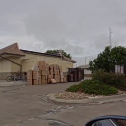 Back of the restaurant, lots of boxes and bread trays.