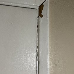 Hi-Way Host Motel - Front door damage