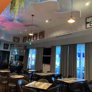 The Palms Coffeehouse - tables and chairs in a restaurant - Coffee & Tea Near Me - Destin, Florida The Palms Coffeehouse - tables and chairs in a restaurant - Coffee & Tea Near Me - Destin, Florida