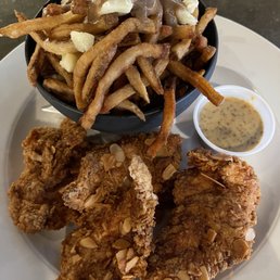 Chicken tenders and poutine. Chicken tenders and poutine.
