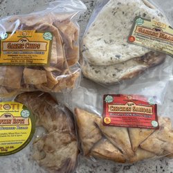Garlic chips, Pumpkin Roti, Chicken Samosas and our house favorite Garlic Naan