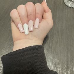 City Nails - They are uneven and lopsided they are all different sizes. Full Set Of Nails not ok for 65 dollars