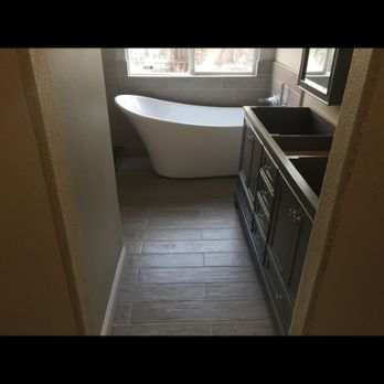 Dirty Wood Construction - Complete bathroom remodel new tub, shower, sinking and cabinets. - Flooring Near Me - Carson City, Nevada Dirty Wood Construction - Complete bathroom remodel new tub, shower, sinking and cabinets. - Flooring Near Me - Carson City, Nevada