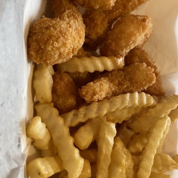 Captain Shrimp - a basket of fried fish and fries - Seafood Near Me - Chicago, Illinois