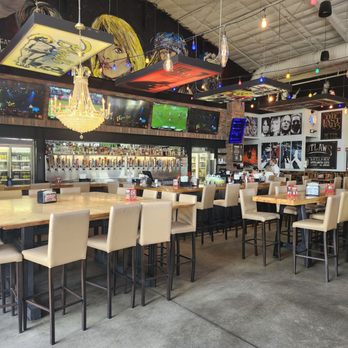 Rock & Brews - Orlando - Feast your eyes on sports or music videos. The high-top chairs are comfy, which isn't always the case at some restaurants - Beer Bar Near Me - Orlando, Florida Rock & Brews - Orlando - Feast your eyes on sports or music videos. The high-top chairs are comfy, which isn't always the case at some restaurants - Beer Bar Near Me - Orlando, Florida