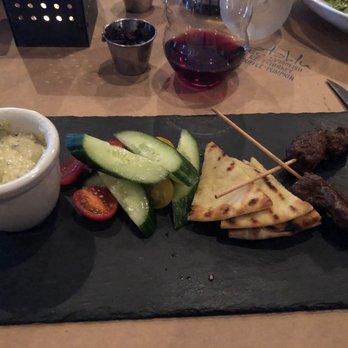 Catablu Grille - Filet Mignon Skewers with pita wedges, cucumbers and lemon hummus dipping sauce - New American Near Me - Fort Wayne, Indiana