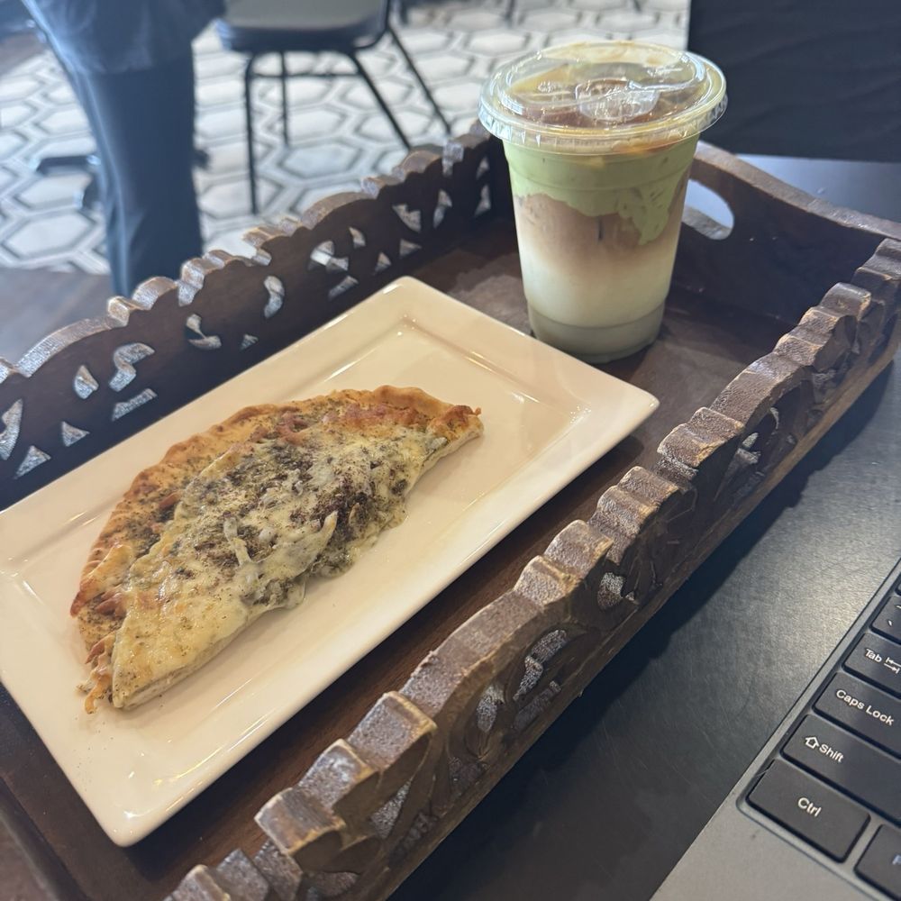 Mokha Cafe - Manakeesh and a pistachio latte while - Coffee & Tea Near Me - Bakersfield, California Mokha Cafe - Manakeesh and a pistachio latte while - Coffee & Tea Near Me - Bakersfield, California