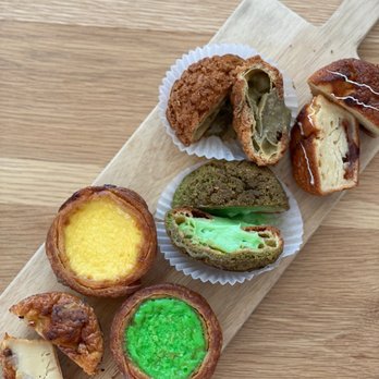 CA Bakehouse - Bottom left to upper right: banana walnut maichi cake, regular & pandan Portuguese Egg tart, Pandan & hojicha choux, guava mochi cake - Bakeries Near Me - San Jose, California CA Bakehouse - Bottom left to upper right: banana walnut maichi cake, regular & pandan Portuguese Egg tart, Pandan & hojicha choux, guava mochi cake - Bakeries Near Me - San Jose, California