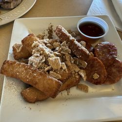 Makaha Valley Country Club - French toast was good but they were deep fried and sort of on the hard side. Was surprised to see crushed cereal on top.
