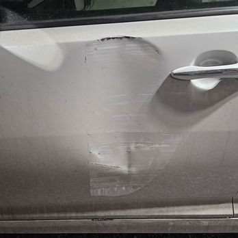 Cermak Auto Care - The parking garage post attacked my door - Auto Repair Near Me - Chicago, Illinois
