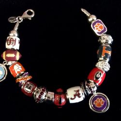 University Shoppe - We carry collegiate Persona beads. You can custom make your own bracelet or necklace!