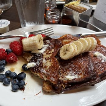 Meli Cafe - Gluten free French toast. Very good and the bread was not crumbly. - New American Near Me - Chicago, Illinois Meli Cafe - Gluten free French toast. Very good and the bread was not crumbly. - New American Near Me - Chicago, Illinois