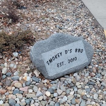 Smokey D's BBQ - Little decorative rock with their beginning here at this location marker - Barbeque Near Me - Des Moines, Iowa Smokey D's BBQ - Little decorative rock with their beginning here at this location marker - Barbeque Near Me - Des Moines, Iowa