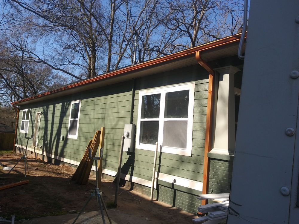 Slide of EW Roofing & Gutters