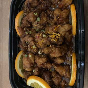 Thai Garden Restaurant - a chicken dish with orange slices - Thai Near Me - Fishers, Indiana Thai Garden Restaurant - a chicken dish with orange slices - Thai Near Me - Fishers, Indiana