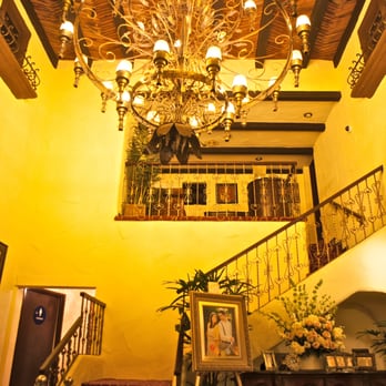 The Villa - Stairs leading to bridal change room. Bathrooms on the left. Flower arrangement on right- included (we decorated with photos) - Venues & Event Spaces Near Me - Westminster, California The Villa - Stairs leading to bridal change room. Bathrooms on the left. Flower arrangement on right- included (we decorated with photos) - Venues & Event Spaces Near Me - Westminster, California