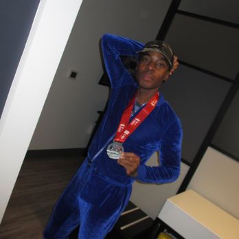 Indianapolis Marathon - Wearing my new half marathon medal - Races & Competitions Near Me - Indianapolis, Indiana