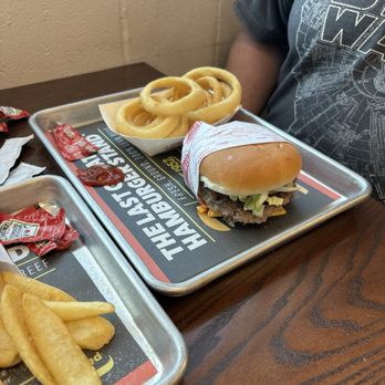 Fatburger - Single cheese far burger with onion rings - Burgers Near Me - Sanger, Texas
