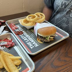Fatburger - Single cheese far burger with onion rings