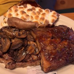 Steak and rib combo with sweet potato. It also came with a second side not pictured.
