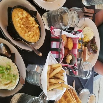 Moonshine Grill - Grits( both versions),rosemary fries, salmon, chicken n waffles( don't need syrup, try them first) , steak n eggs, Didn't want to leave... - Southern Near Me - Austin, Texas Moonshine Grill - Grits( both versions),rosemary fries, salmon, chicken n waffles( don't need syrup, try them first) , steak n eggs, Didn't want to leave... - Southern Near Me - Austin, Texas