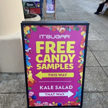 IT'SUGAR - a free candy sample sign on a sidewalk - Candy Stores Near Me - Santa Cruz, California IT'SUGAR - a free candy sample sign on a sidewalk - Candy Stores Near Me - Santa Cruz, California