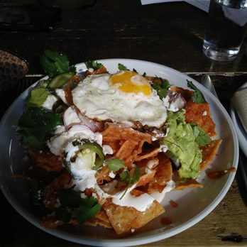 Manuela - Chilaquiles (crema, fried egg, pickled jalapeño, avocado, radish). Great flavor and portions! - New American Near Me - Los Angeles, California Manuela - Chilaquiles (crema, fried egg, pickled jalapeño, avocado, radish). Great flavor and portions! - New American Near Me - Los Angeles, California