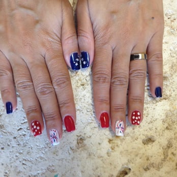Blackhawk Nails & Spa - Natural Nails - Gelish Polish (red, white, blue), star rhinestone embelishment, firework design- glitter and gelish polish - Nail Salons Near Me - Danville, California
