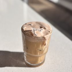 Hazelnut latte w/ banana cold foam