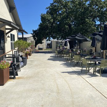 Sunset Grill - you can sit on the patio. Enjoy the fresh flowers and the smell of summertime fun. - American Near Me - Fredericksburg, Texas Sunset Grill - you can sit on the patio. Enjoy the fresh flowers and the smell of summertime fun. - American Near Me - Fredericksburg, Texas