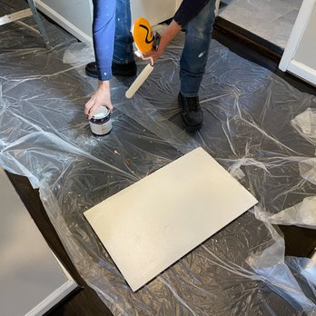 Nunnez Contractors - Repainted attic door drying on plastic sheet - Drywall Installation & Repair Near Me - Woodbridge, Virginia
