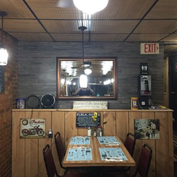 The Ave Diner - a brick wall and a wooden table - Diners Near Me - Montrose, Pennsylvania The Ave Diner - a brick wall and a wooden table - Diners Near Me - Montrose, Pennsylvania