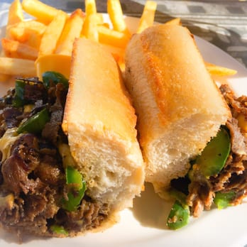 Tony's Pizza - Steak and cheese panini with fries - Pizza Near Me - Saint Petersburg, Florida Tony's Pizza - Steak and cheese panini with fries - Pizza Near Me - Saint Petersburg, Florida