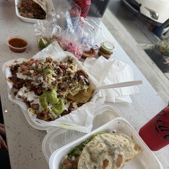 Tacos La Rueda - We got a taco Perron each and we shared the Al pastor nachos. I'm glad they had multiple salsas and the pickled onions. - Tacos Near Me - Bellflower, California Tacos La Rueda - We got a taco Perron each and we shared the Al pastor nachos. I'm glad they had multiple salsas and the pickled onions. - Tacos Near Me - Bellflower, California