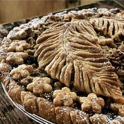 Heather's Pies - Feathers from this Heather and Blueberries in Season all year long kind of pie. Buttercrust made.