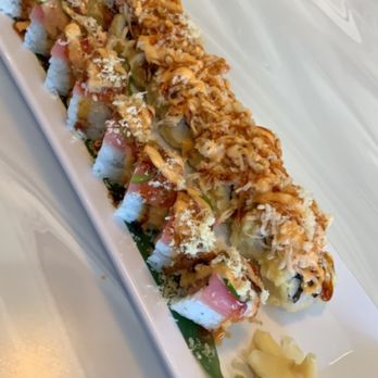 Rock N Roll Sushi - On the left is the red hot chili pepper roll and on the right is the michael jackson roll - Sushi Bars Near Me - Spring, Texas Rock N Roll Sushi - On the left is the red hot chili pepper roll and on the right is the michael jackson roll - Sushi Bars Near Me - Spring, Texas