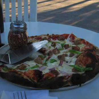 Wild Tomato - The Pizza - Pizza Near Me - Fish Creek, Wisconsin Wild Tomato - The Pizza - Pizza Near Me - Fish Creek, Wisconsin