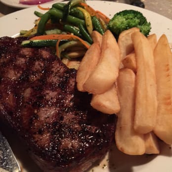 Baxter's - Grade A 14 oz ribeye, Steak fries, vegetable medley. - American Near Me - Fernandina Beach, Florida