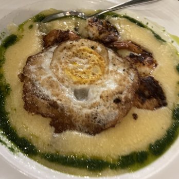 Foster's Kitchen Waikoloa - Shrimp and grits- hawaiian style w an egg on top! - American Near Me - Waikoloa, Hawaii