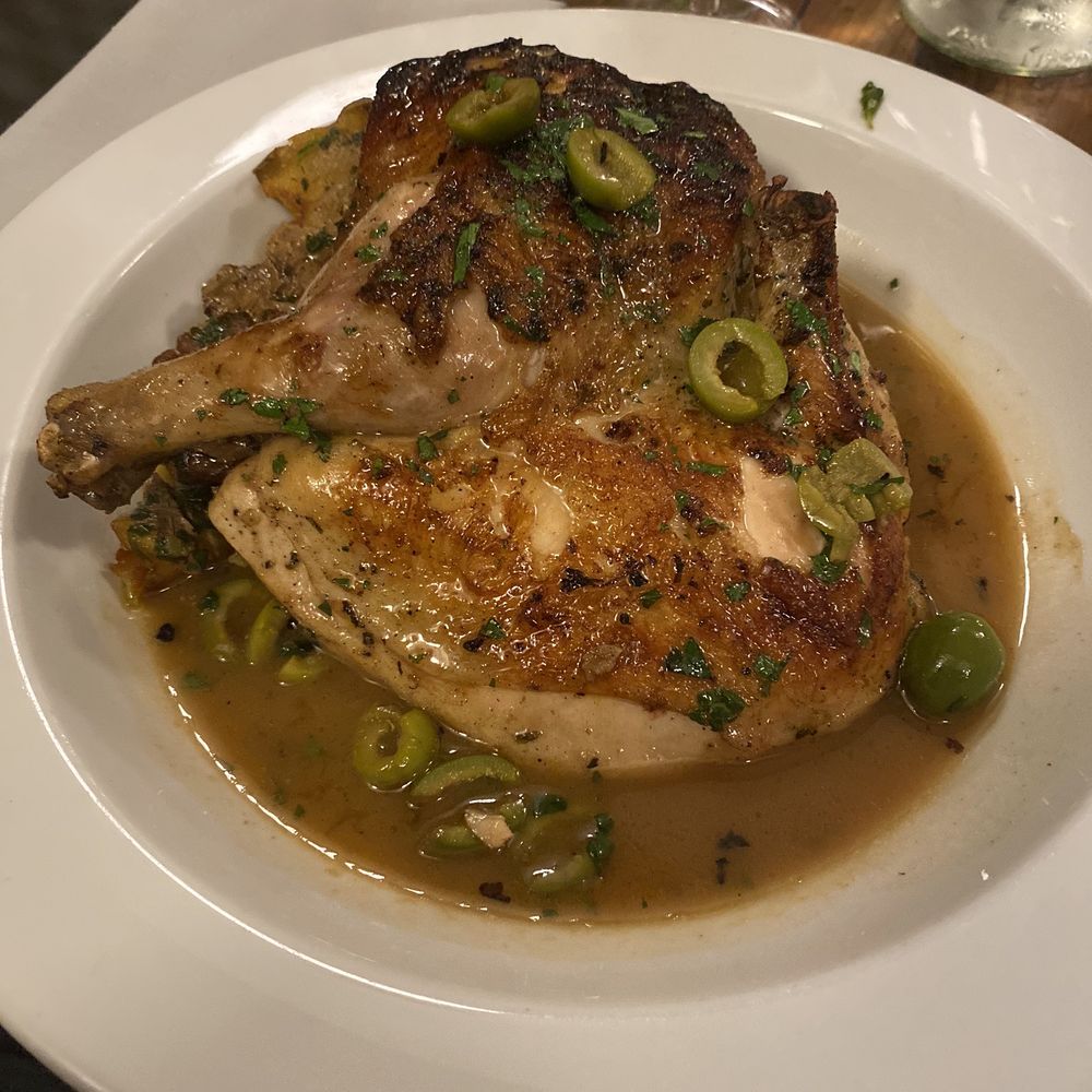 Emilia - Pollo Ál Mattoné:  ABSOLUTELY DELICIOUS! Sous vide to a perfect balance of tender and juicy chicken. I'd drink the sauce from a boot! - Italian Near Me - Knoxville, Tennessee