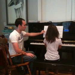 Starburst Piano & Voice Studios - Watching her fingers while directing her vision.