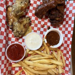 The Poop Deck Bar and Grill - Garlic Parmesan, and spicy wings