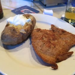 Porterdale Bar & Grill - Wienerschnitzel and a baked potato. Fresh pounded and very tasty.