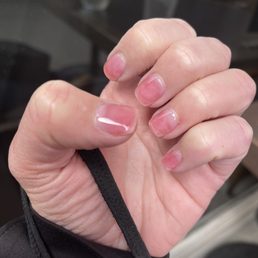 I asked for pink acrylic... this is the worst job I've ever had done on my nails.