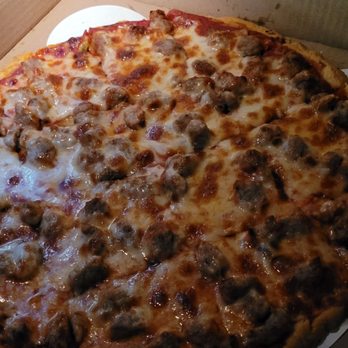 Home Run Inn Pizza - 14 inch traditional thin with butter crust. Sausage and fried garlic. - Pizza Near Me - Hillside, Illinois Home Run Inn Pizza - 14 inch traditional thin with butter crust. Sausage and fried garlic. - Pizza Near Me - Hillside, Illinois